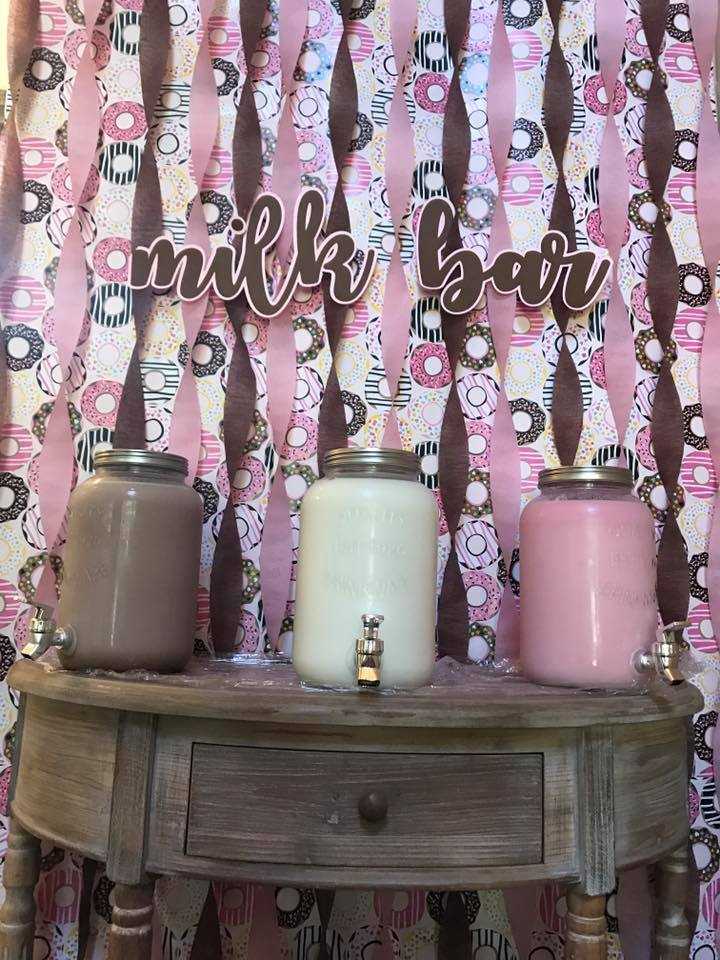 Three different flavored milk dispensers for the milk bar