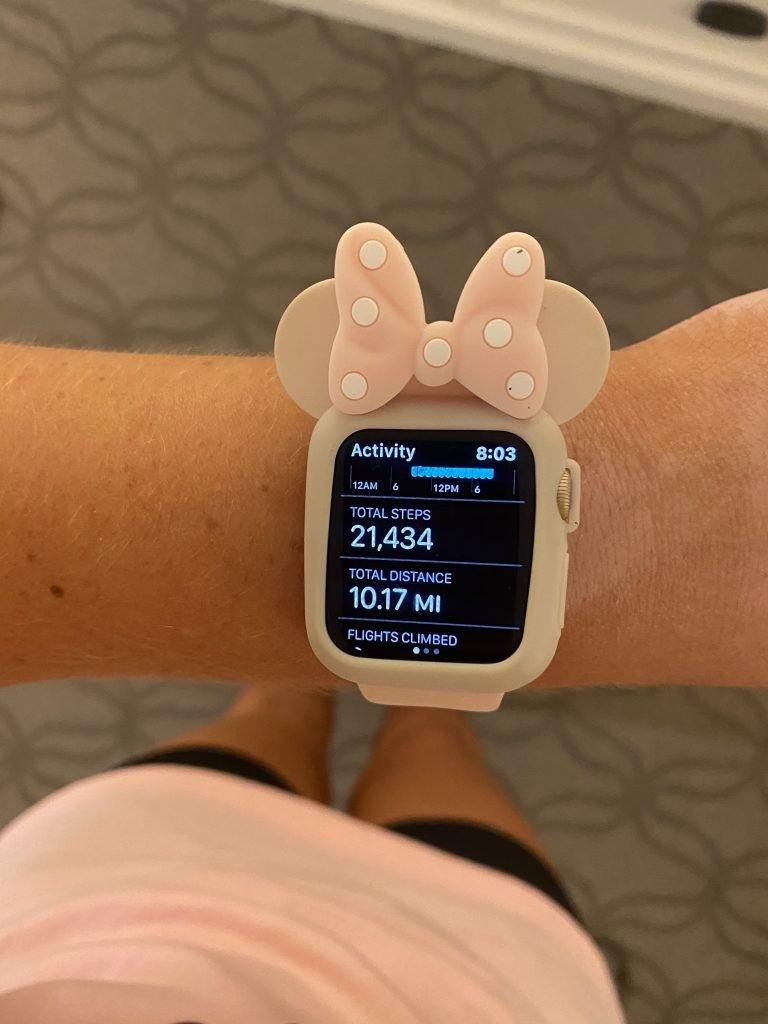 Apple watch face with Minnie Ears case, sharing steps taken in one day at Disney World.