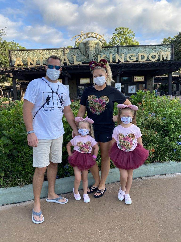 Kristen, Andrew, and the two girls in front of Animal Kingdom.