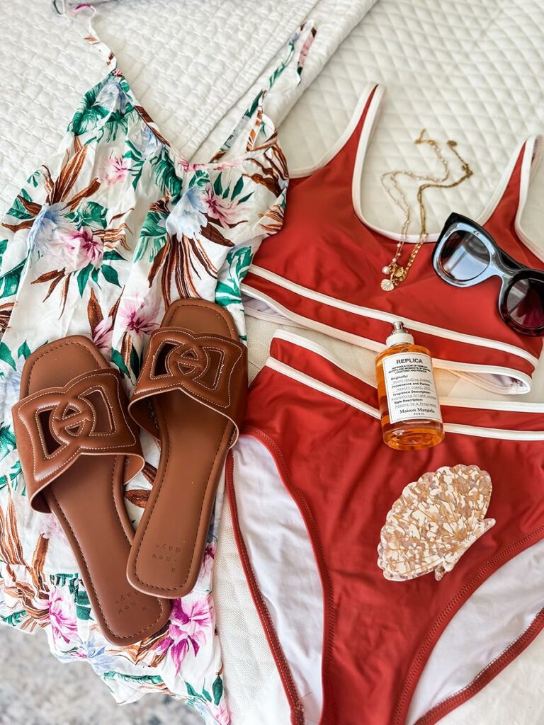 coral swimwear outfit flatlay